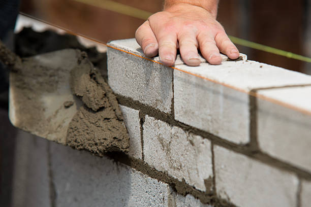 Bricklayer at work on site